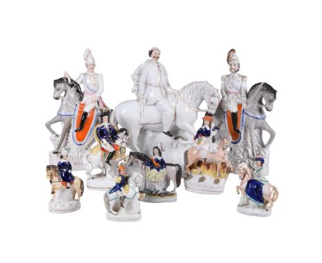 A group of nine various Staffordshire equestrian figures, various dates mostly mid-19th century, including a Victor Emmanuel,