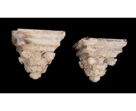 A pair of painted and parcel gilt composition architectural wall brackets, 19th century, 45cm high, 50cm wide, 39cm deepCondi