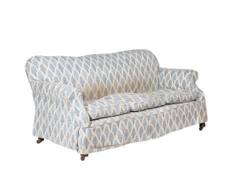 A late Victorian mahogany and upholstered sofa, circa 1890, upholstered with blue palmettes on an ivory ground, 86cm high, 18