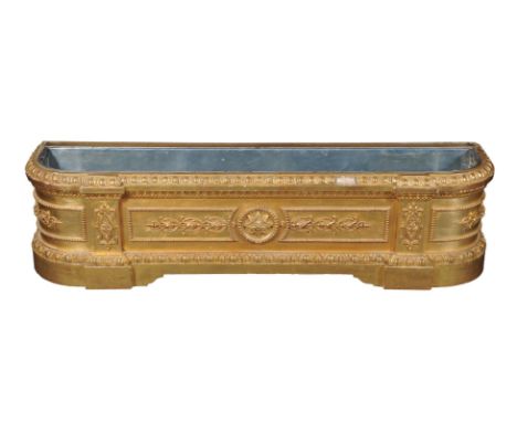 A French giltwood and composition banquette or jardiniere, late 19th century, with upholstered top above interior with liner,