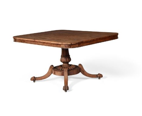 A William IV mahogany breakfast table, circa 1830, the rectangular tilt top with rounded corners, on a lappet carved stem, th