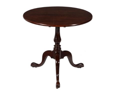 A George III mahogany tripod table, circa 1770, with baluster stem, on roller castors, 74cm high, 76cm diameterCondition Repo