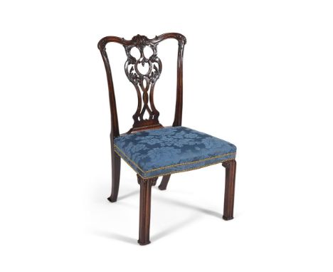 A George III mahogany side chair, circa 1765, in the manner of Thomas Chippendale, the serpentine top-rail above a pierced va