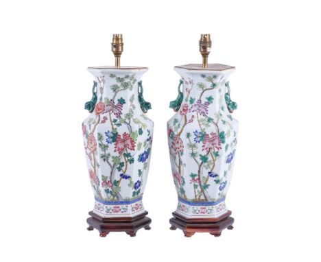 A pair of modern Chinese porcelain hexagonal section famille rose lamp bases, 42.5cm high excluding fitmentsCondition Report: