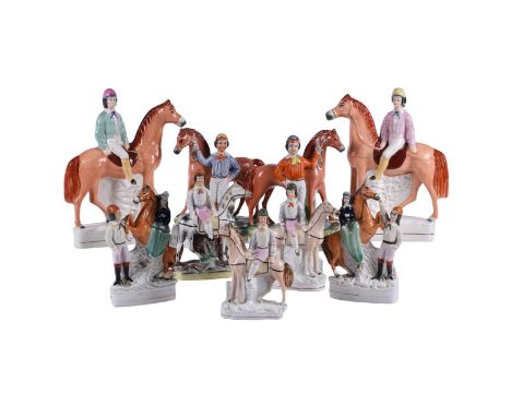 A group of nine various Staffordshire equestrian groups and figures of mostly jockeys, mid 19th century, 29cm high and smalle