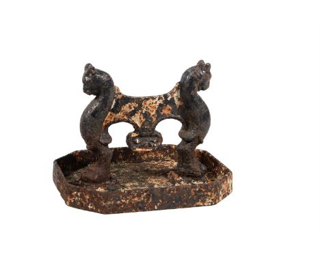 A cast iron bootscrape in Regency taste, first half 19th century, the scrape blade supported on monopodia, 28cm highCondition