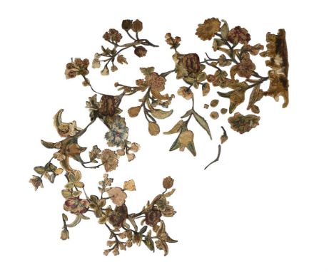 A group of silk appliqué fragments, first half 18th century, trailing flowers and foliage, in need of remounting, the longest
