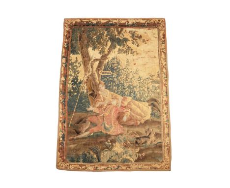 An Aubusson tapestry, 18th century, depicting a courting couple beneath a tree with attendant hound, approximately 250 x 170c