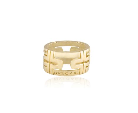 A GOLD PARENTESI RING, BY BULGARIThe openwork wide band of geometric design, the sides engraved 'BVLGARI', in 18K gold, Itali