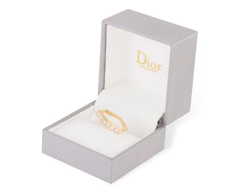 A DIAMOND RING, BY DIORThe hexagon-shaped hoop set to the front with round brilliant-cut diamonds, mounted in 18K gold, diamo