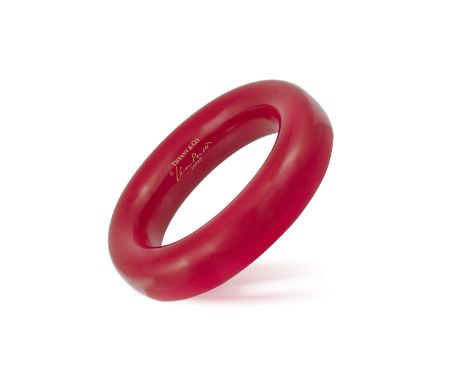 A LACQUER BANGLE BY TIFFANY &amp; COThe bombé wood bangle with Japanse red lacquer throughout, signed Elsa Peretti for Tiffan