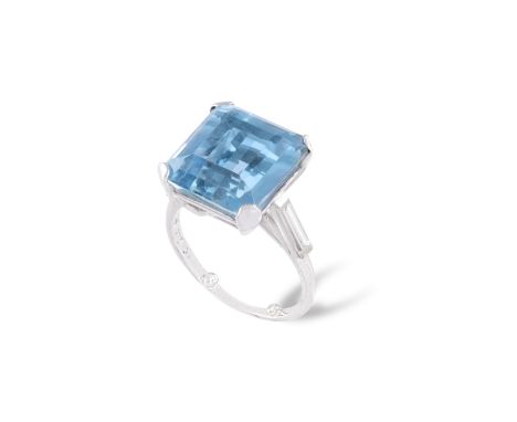 A FINE AQUAMARINE AND DIAMOND DRESS RINGThe cut-cornered rectangular-cut aquamarine weighing approximately 8.50cts within fou