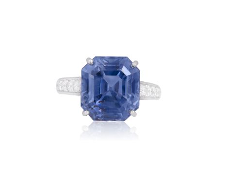 A SAPPHIRE AND DIAMOND DRESS RINGThe octagonal-shaped sapphire weighing approximately 16.30cts, within a four-claw setting, p