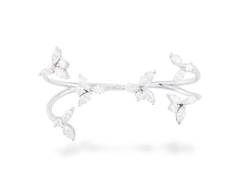 A DOUBLE-FINGER DIAMOND COCKTAIL RING, BY YEPREMComposed of two hoops, each with three terminals highlighted with marquise an