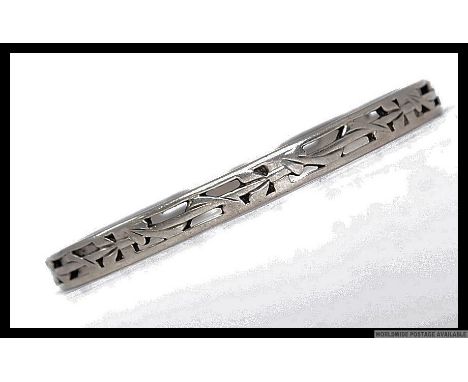 Hallmarked silver bangle with pierced deoration. Weight 18.6g.