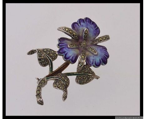 A vintage white metal enamel and marcasite stylised pansy flower brooch. Length 5cms. Weight 16.1g