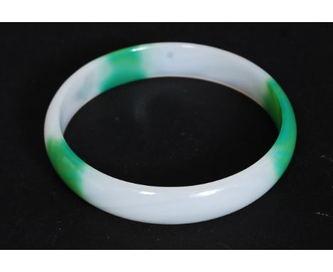 A 20th century Chinese oriental green and white jade bangle bracelet

FREE UK POSTAGE ON ALL LOTS INCLUDING COMBINED PURCHASE