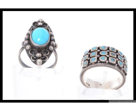 Two silver dress rings with turquoise decoration. Size K, M.