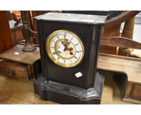 A Victorian black slate mantel clock, dial name worn, possibly Hall, Manchester