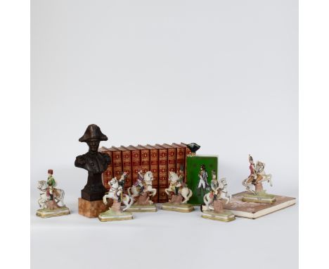 Lot Napoleon, showcase with 6 porcelain figurines, wooden bust, cognac bottle as a book, series of books on the life of Napol