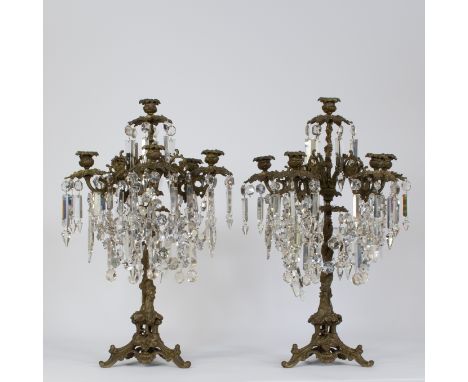 A fine pair of French girandole candlesticks, LXVI-style, bronze and richly decorated with crystal plaquesEen mooi paar Frans