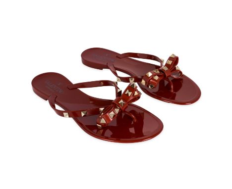 VALENTINO ROCKSTUD FLIP FLOP SANDALS Condition grade A - unworn. Size 38. Maroon PVC flip flops with light gold toned rock st