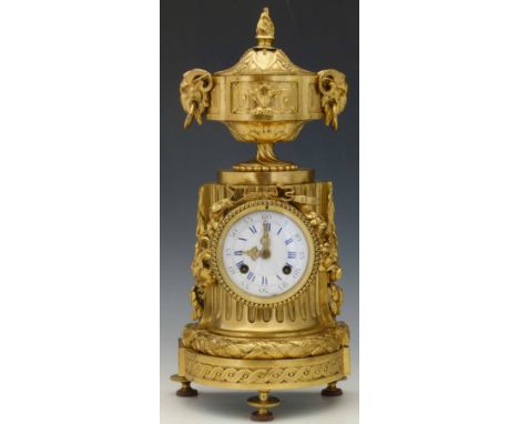 French neo-classical ormolu mantel clock modelled as a fluted column supporting a lidded urn, the white enamel Arabic and Rom