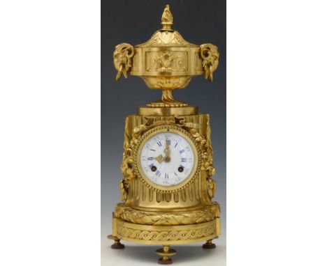 French neo-classical ormolu mantel clock modelled as a fluted column supporting a lidded urn, the white enamel Arabic and Rom