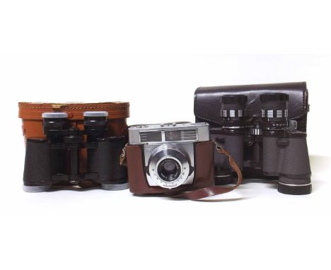 cased Zeiss Ikon Symbolica camera together with two cased binoculars (3) Condition report: see terms and conditions