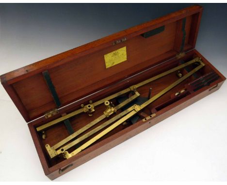Brass scaling pantograph by W.F. Stanley, Great Turnstile, Holborn, the long side 66cm, on four ivory wheels, with a lead-wei