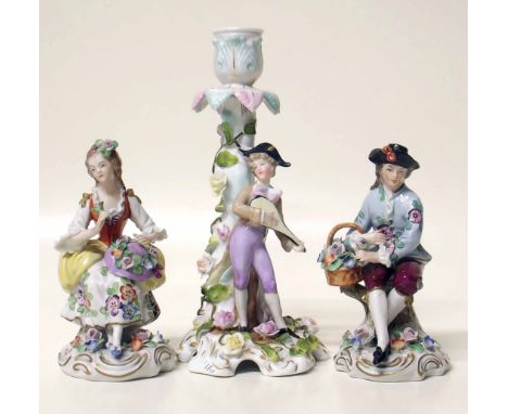 Pair of Sitzendorf figures and a candlestick figure Condition report: see terms and conditions