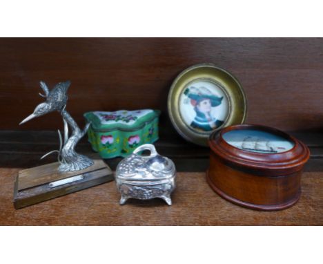 An enamelled butterfly trinket box, a painted enamel wall plaque, an Art nouveau trinket box, a pewter model of a Kingfisher 