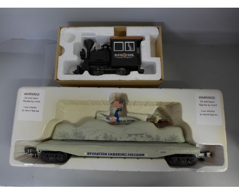 K-Line by Lionel; a die-cast Beaver Creek Logging Co. Powered Unit and an Operation Enduring Freedom Get Osama operating car 