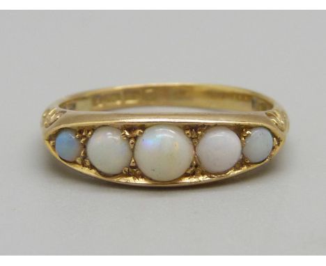 A late Victorian 18ct gold, five stone opal ring, Birmingham 1899, 4.7g, S 