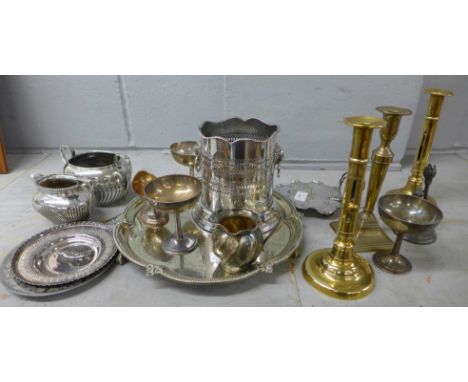 Plated ware including a tray and a bottle holder, a pair of brass candlesticks, one a/f, a figural candlestick, etc.