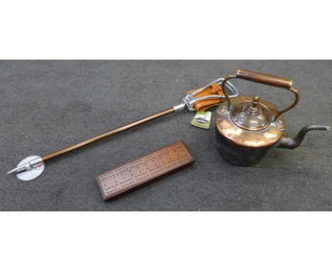 A Gamebird shooting stick, unused with tag, a copper kettle and a wooden cribbage board 