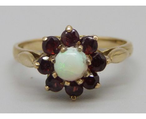 A 9ct gold, garnet and opal cluster ring, 2.4g, N 