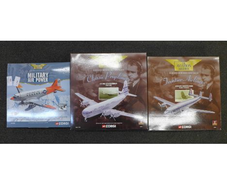 Three Corgi model aircraft; two The Aviation Archive and Military Airpower 