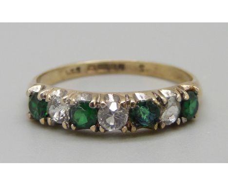 A 9ct gold green and white stone ring, one stone replaced, 2.1g, P 