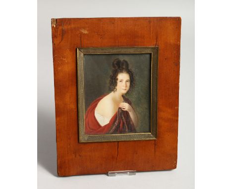 A 19TH CENTURY PORTRAIT MINIATURE OF A YOUNG LADY 4.5ins x 3.5ins in a wooden frame
