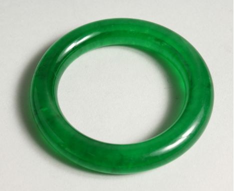 A GREEN JADE BANGLE