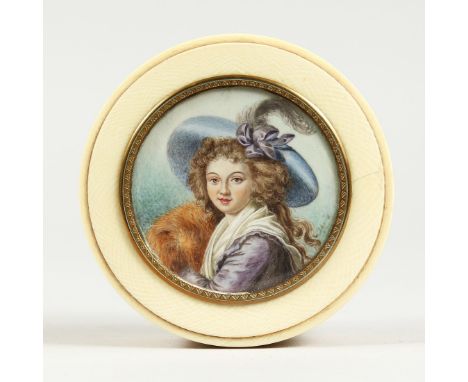 A GEORGIAN IVORY CIRCULAR BOX, the top painted with a portrait of a young lady in a plumed hat. 3ins diameter.