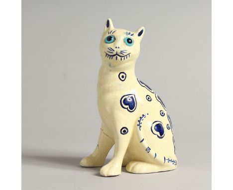 A SMALL GALLE STYLE POTTERY MODEL OF A CAT. 6ins high