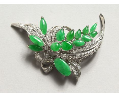 A SUPERB DIAMOND AND JADE FLORAL BROOCH set in18ct white gold