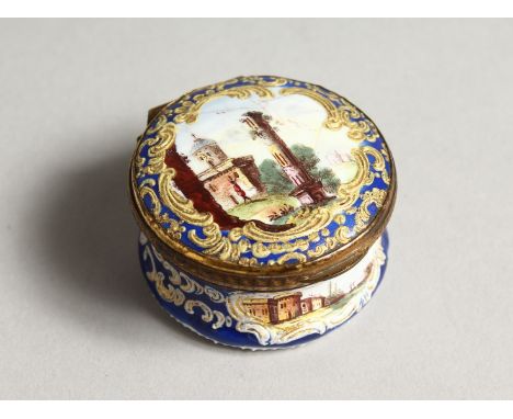 A BATTERSEA ENAMEL CIRCULAR SNUFF BOX the lid with a ruin 1.5ins diameter