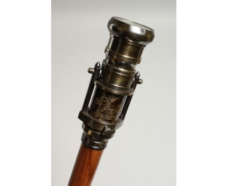 A WALKING STICK with a telescope and compass 36ins long