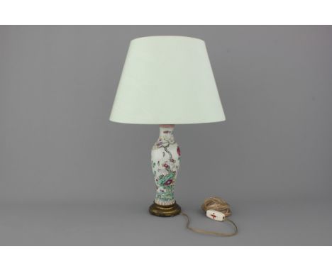 A Chinese porcelain famille rose vase mounted as lamp, 18th C., Qianlong H: 61 cm, incl. the lamp shade