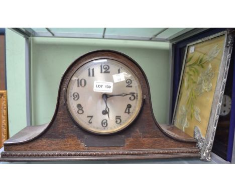 Oak Cased Mantle clock, together with a small metal framed tea tray&nbsp;