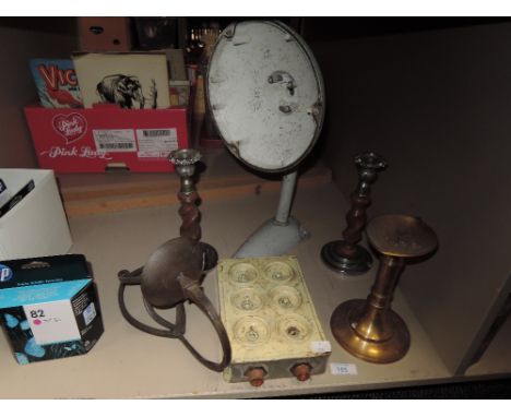 A selection of candle sticks and industrial light switch 