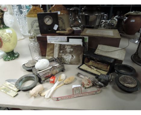 An assortment of vintage and antique collectables including tea caddy, fruit knifes, beer barral stop holes, postcards, compa